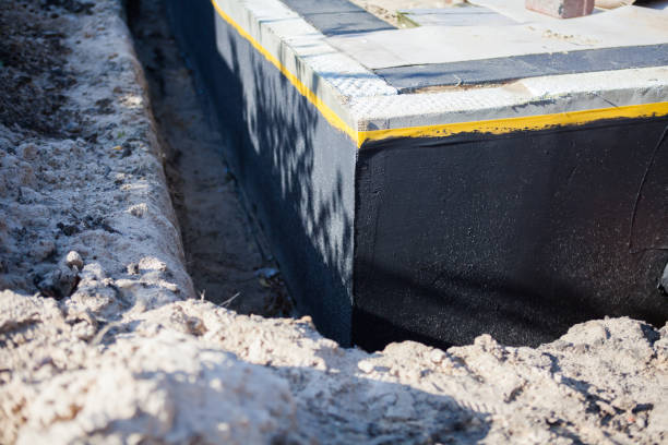 Professional Emergency Waterproofing technician working in Maineville, OH